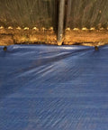 Image of blue tarp secured by 30 Pack 4.3 Inch Plastic Stakes Anchors Beefy Rustproof Thick Resin For Holding Down Landscape Fabric
