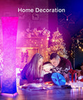 Slender 39 Inch Floor Lamp With Remote Control, RGB Color Changing LED Lights for vibe mood lighting next to a family decorating