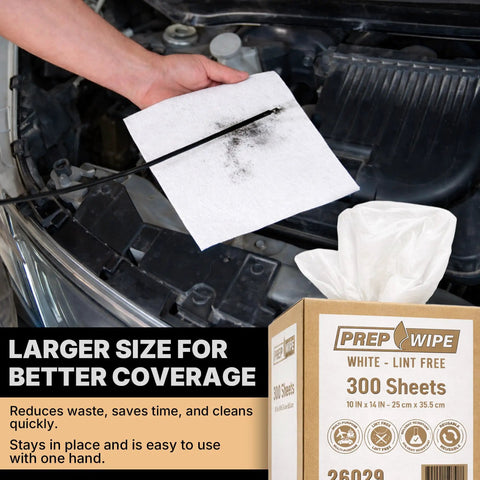 Hand holding Prep Wipe White Lint Free Cleaning Towels 300 Sheets 10 by 14 Inches near car engine with towel box in view