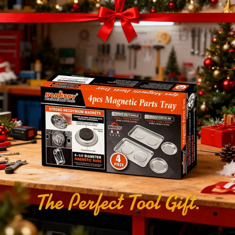 Box of 4-piece magnetic parts tray set on a workbench, ideal for organizing nuts and bolts, with tools and festive decor in background.