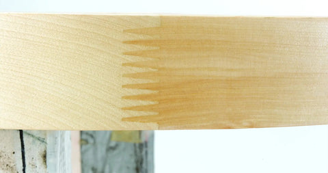 Close-up of maple wood grain showing joint detail for Premium Wood Lazy Susan Double Tier Turntable For Corner Base Cabinets With Smooth As Butter Chrome Hub Adjustable Telescoping Post Includes Required Mounting Hardware.