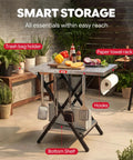 Foldable Outdoor Grill Table And Prep Station With Pizza Oven Base And Griddle Stand showing paper towel rack and trash holder
