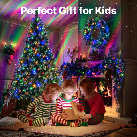 Children in pajamas gazing at a gift with Epic Galaxy Projector Star Light illuminating a Christmas scene with a tree and fireplace.