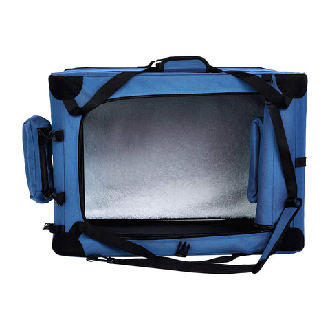 Top view of Tail Waggin Road Trip Ready Soft Sided Dog Crate And Foldable Pet Carrier For Small Dogs Under 25 Pounds, blue, with heavy duty zippers and mesh straps.