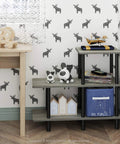 Three Tier Ladder Shelf Cube Bookcase For Bedroom Living Room Or Home Office Slick French Oak Grey With Black Tubes in a corner with toys and decor.