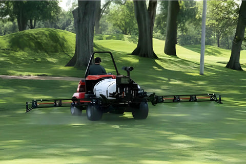 12V Heavy-Duty Automatic Demand Diaphragm Pump with 5.3 GPM spraying on golf course