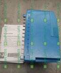 RM7800L1012 Heavy Duty Industrial Control Module in an enclosed blue box for PLC systems on a concrete surface