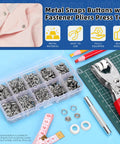 Comprehensive 407 Piece Metal Snap Button Kit Featuring Three Eighths Inch Silver Fasteners with heavy duty press pliers and tools.