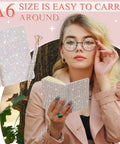 Woman holding Bling Rhinestone Notebook Set Glitter Pocket Journal With Crystal Pen Mini Diamond Diary Hardcover For Women A6 Size Silver Office Desk Accessories Birthday Gift in outdoor setting.