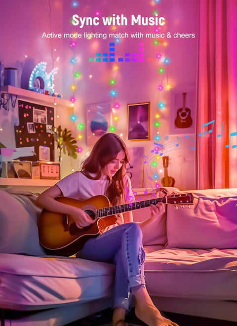 Woman playing guitar with App Controlled Curtain String Lights With 400 LED Pixel Art And Text Creator, music sync feature in room.