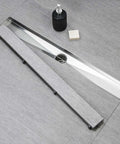 32 Inch Linear Shower Drain With Tile Insert And Flat Cover Brushed 304 Stainless Steel 2 Inch Outlet Leveling Feet And Hair Strainer No Fuss Install For Modern Shower Floor in bathroom setting