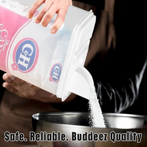 Hassle Free Eight Quart Clear Food Storage Bin With Slick Pour Spout And Grippy Handle pouring sugar into a bowl.