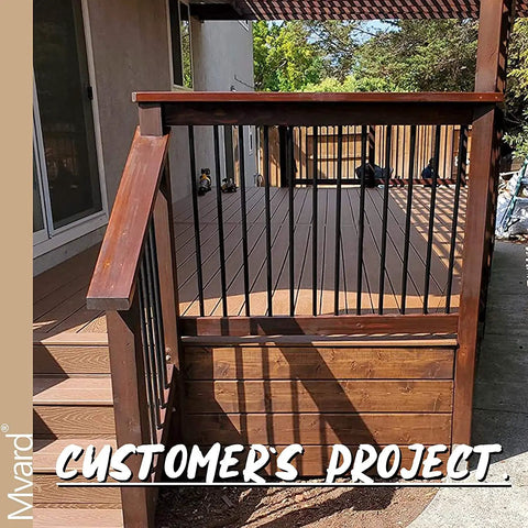 Upgrade Your Deck Game With These Rock Solid 26 Inch Hollow Round Aluminum Balusters In A Slick Matte Black Finish Easy Rack And Stack Setup For Railing Projects tough matte black balusters installed in a wooden railing.