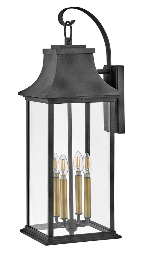 Extra Large Outdoor Wall Lantern Featuring Heritage Brass And Aged Zinc Finish Dang Tough Aluminum Build Clear Glass Panels Classic Coach Light Silhouette side view.