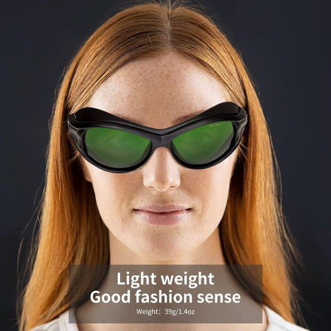 Killer OD6 Plus Laser Safety Glasses Delivering Savage UV Defense Across 180 to 420 nm and 740 to 1100 nm Spectrums for Serious Industrial and Commercial Ops With EN207 Certification Standards, worn by a woman with auburn hair.