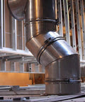Single Wall Stainless Steel Pre Engineered Grease Duct for smoke and grease vapors removal, featured in industrial setting