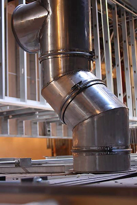Single Wall Stainless Steel Pre Engineered Grease Duct for smoke and grease vapors removal, featured in industrial setting