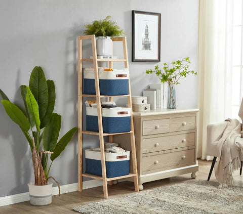Tough As Nails Heavy Duty Fabric Storage Bins With Reinforced Metal Frame And Faux Leather Handles, Large Closet Organizers Making Shelves A Total Game Changer, 3 Pack For Quick Cleanup stacked on a wooden ladder shelf.