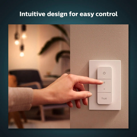 Hand operating 2 Pack Indoor Hue Wall Switch Modules For Smart Lighting Keeps Your Hue Lights Reachable When Off, Easy Install Behind The Switch, Requires Hue Bridge For Full Remote Control, Automations, And Smarter Scenes on a modern wall