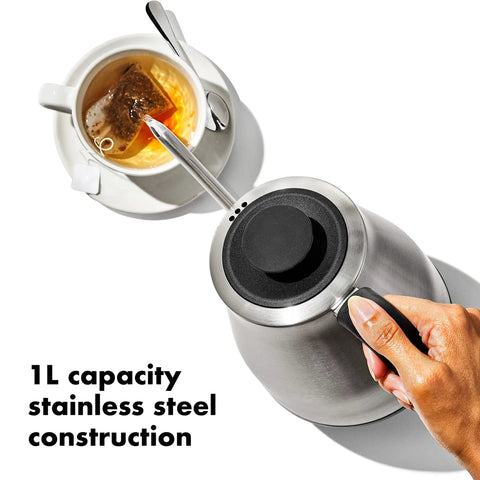 Top view of 1L stainless steel Gooseneck Electric Kettle For Pour Over Coffee And Tea With Dialed In Temperature next to a cup of tea