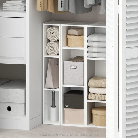 Hella Efficient Three Tier Closet Organizer With Open Shelf Storage For Bedroom Wardrobe Space Saving Slim Floor Rack In Pristine White displaying rolled towels, boxes, and folded linens.