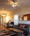 Living room with ceiling light fixture and modern decor, showcasing potential setup for 3 In 1 E26 Light Socket Adapter With 360 Degree Rotation