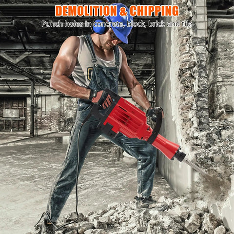 Solid Build Heavy Duty Electric Jack Hammer Concrete Breaker Demolition Rig For Ripping Through Slabs Quick Change Chuck System With Armor Case Makes Hard Labor Feel Light in action, breaking concrete.