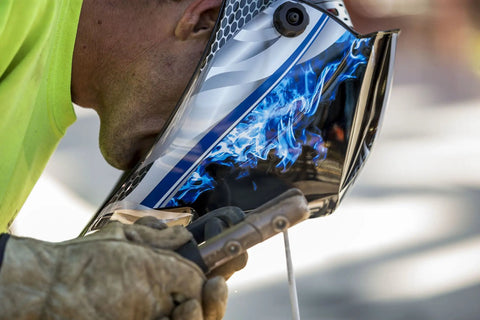 Welder using Wham 3030FM Auto Darkening Welding Helmet with Pivot Headgear for comfort and safety in close-up view