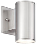 Sleek Six Inch LED Outdoor Wall Sconce For Front Door And Wraparound Porch Bringing Darn Bright Integrated Bulb Free Illumination In Smooth Satin Platinum mounted on a wall.