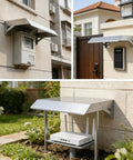 Heavy Duty EV Charger Cover With Sloped Stainless Steel Roof, Rock Solid Weatherproof Sun Shade Canopy, All Season Electric Vehicle Charging Station Shield, Built Tough To Kick Rain And Snow mounted on a wall, protecting a meter and keypad.