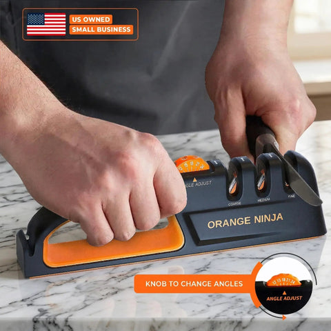 Person using Multi Angle Knife Sharpener With Five Angle Settings And Three Stage System For Home Cooks on marble countertop