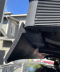 Close-up of Premium Flexible Wind Deflector Fairing for Roof Rack Crossbars, foam rubber material, showing attachment detail.