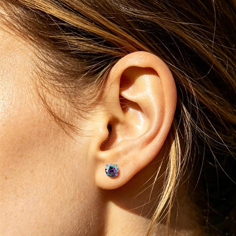 Premium 5A Cubic Zirconia Screw Back Stud Earrings For Men And Women, showcased on a model's ear, highlighting the design.