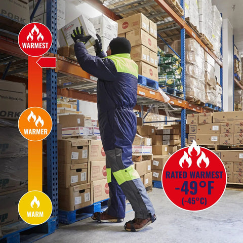 Worker reaching for a box in a freezer, wearing Heavy Duty Insulated Freezer Work Coveralls Built To Blast Through The Deep Freeze With Rock Solid Thermal Armor And Water Repellent Winter Job Gear For Cold Storage Crews.