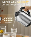 2.5L Large Electric Kettle With Stainless Steel Construction BPA Free Fast Boil Auto Shut Off Boil Dry Protection Ideal For Family Tea Coffee And Instant Meals, pouring hot water into a glass on a kitchen counter.