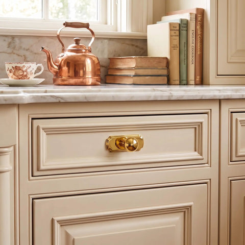 Heavy Duty Zinc Alloy Cabinet Knobs 2 Pack With Solid Backplate Hella Sturdy Drawer Pulls For Kitchen Cupboard And Dresser Hardware Slick Champagne Bronze Finish on drawer.