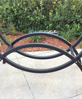 3 Foot Crescent Firewood Rack Heavy Duty Indoor Outdoor Steel Log Holder With Black Powder Coat Finish And Cover Made In USA Lifetime Structural Warranty UV Stabilized Finish And Simple Assembly on patio
