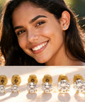 Hypoallergenic Titanium Screw Back Earrings Set Three Pairs VVS1 Sparkling Moissanite Studs displayed on a smiling woman.