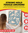Person hanging a picture with Heavy Duty Drywall Anchors and Screws Kit for 80 lbs load, suitable for versatile home improvement.