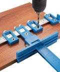 Adjustable Cabinet Hardware Jig With Quick Release Drill Guide For No Fuss Precise Hole Spacing And Dowelling in use on wood board