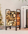 Sturdy Firewood Rack And Log Holder For Indoor Outdoor Use Heavy Duty 25mm Tubular Steel Log Storage Stack Supports Up To 400 Pounds Rustproof Black Powder Coated Firewood Organizer For Fireplace And Patio next to a decorated tree and fireplace