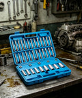 39 Piece Strut Service Kit With Piston Rod Holder And Nut Socket Set For Car Suspension Repair in blue case on workshop bench