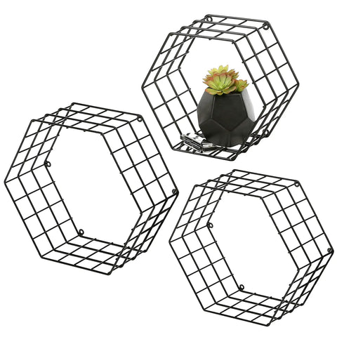 Matte Black Hexagonal Wire Mesh Floating Shelves Set Of 3 Wall Mounted Display Rack For Bedroom Or Office with a small plant.