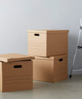 Straight Up Reliable Medium Packing Boxes With No Drama Lift Off Lids And Double Bottom Corrugated Cardboard Storage Containers For Chill Moving Days Pack Of Ten stacked with open lid and handles.