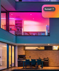 Modern home with Crazy Bright Supercolor BR30 Smart Flood Bulbs 2 Pack RGB Plus Tunable White lighting from outside at sunset.
