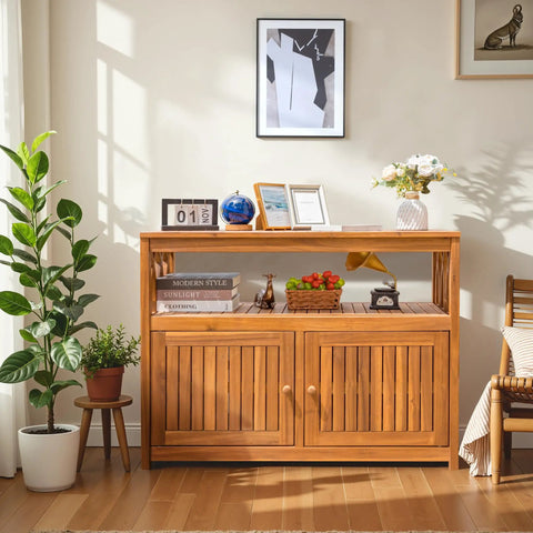 Weatherproof Acacia Wood Outdoor Storage Cabinet With Two Magnetic Doors And Three Level Storage in a living room setting.