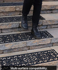 Person stepping on Non Slip Rubber Stair Treads For Indoor Outdoor Stairs 35x10 Inches 5 Pack Anti Skid Mat on stone steps