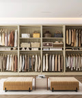 Built Different 12 Foot Modular Closet System With 8 Hanging Rods, Heavy Duty 4 Piece Wood Wardrobe Organizer With 2800 Lbs Capacity, White Oak Finish Wall To Wall Storage Shelves For Walk In Closets with clothes and accessories.