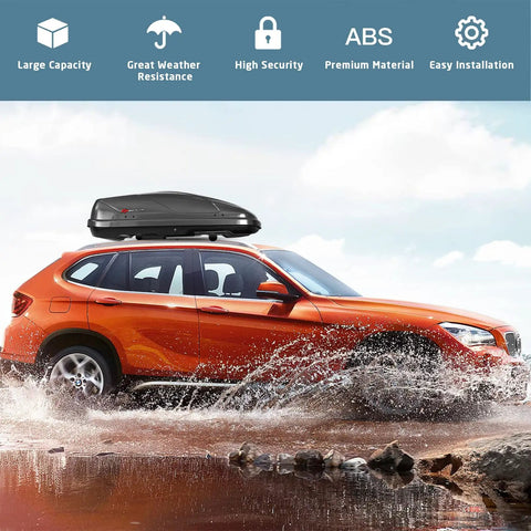 Rock Solid Rooftop Cargo Carrier Hard Shell Waterproof Gear Box featuring dual side opening on a car navigating water.