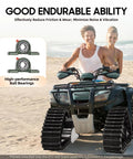 ATV on sandy beach equipped with 23.6 Inch Rear Axle Track Kit Assembly for ATV Go Kart Snowmobile Snow And Sand Adventures